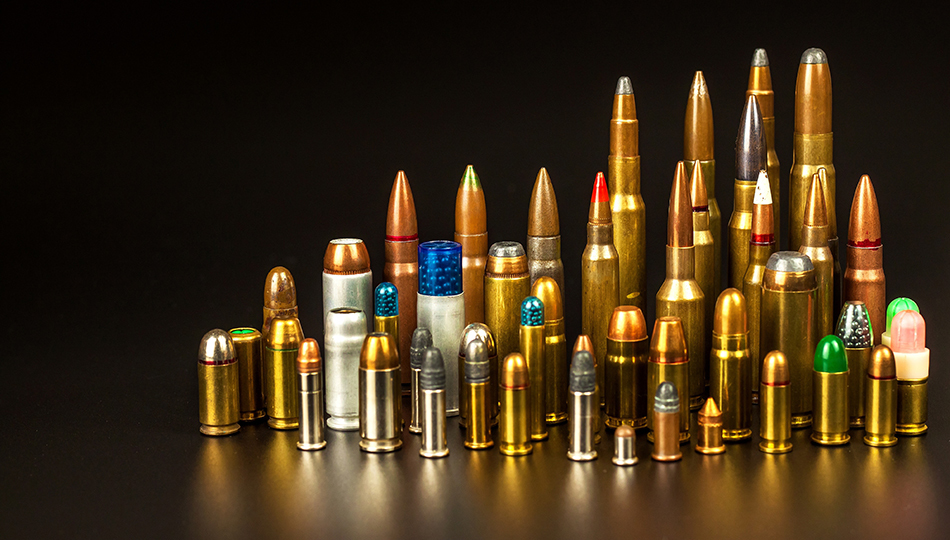 Different types of ammunition on a black background. Sale of wea Ammunition